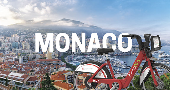 Visual of the city of Monaco and a Monabike
